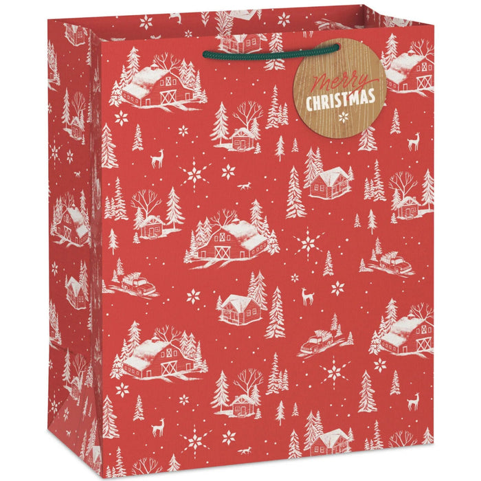13-inch large Christmas gift bag featuring snowy barns on a red background with an included gift