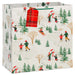 15-inch extra-deep Christmas gift bag featuring vintage sledding and skating artwork with an included gift tag.