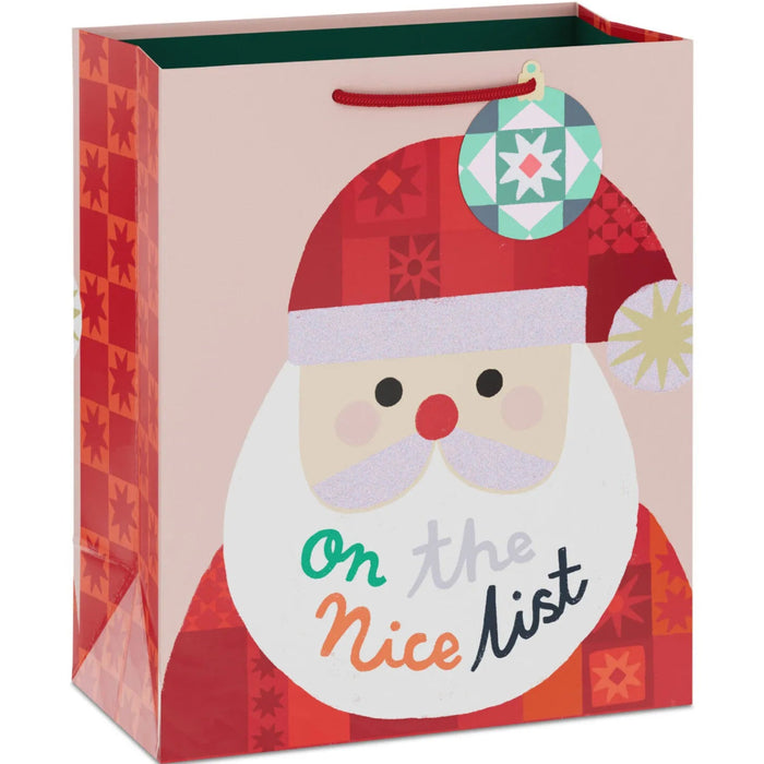 9.6-inch medium Christmas gift bag featuring a glittery quilted Santa design with an included gift tag.