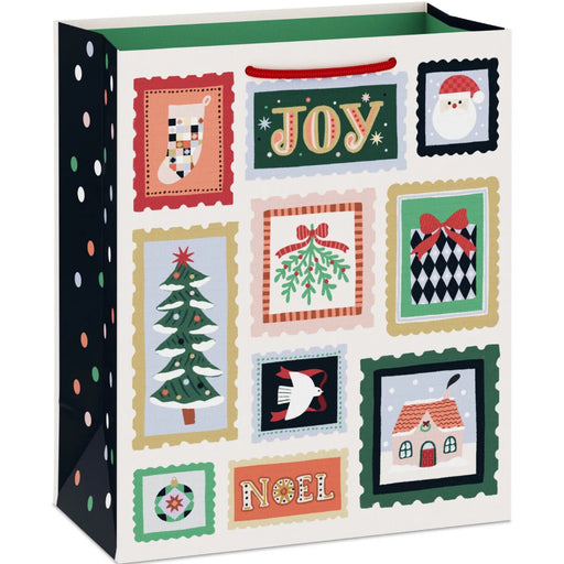 9.6-inch medium Christmas gift bag featuring a playful winter stamps-inspired design with festive seasonal artwork.