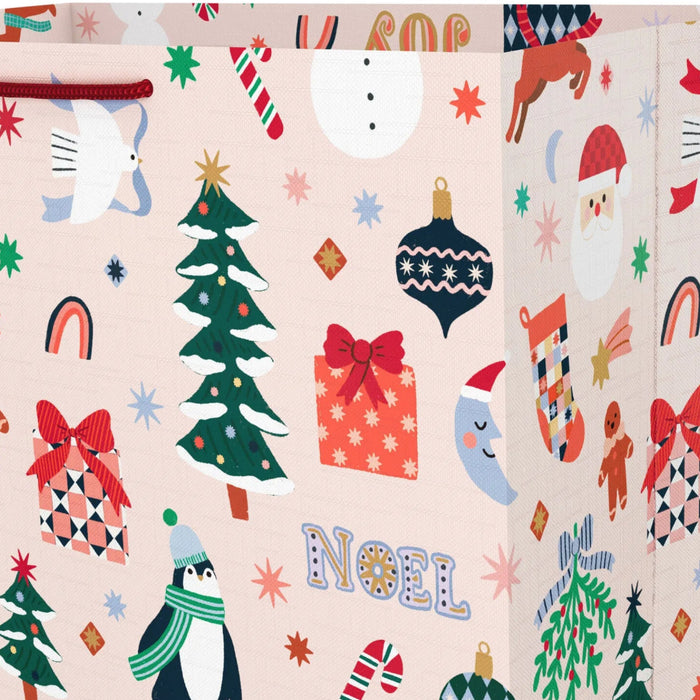 Jumbo blush Christmas gift bag featuring cozy seasonal icons for festive holiday gift giving