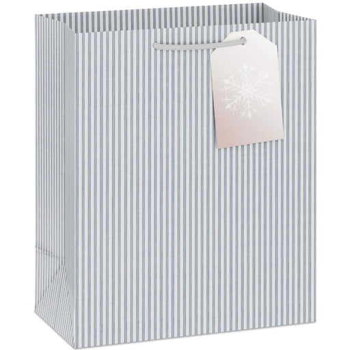 9.6-inch medium Christmas gift bag with stripes, rose gold snowflakes, and a gift tag