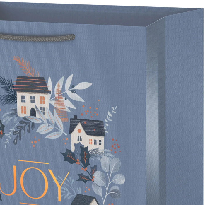 13-inch large icy blue Christmas gift bag featuring cozy cottage designs for holiday gifting