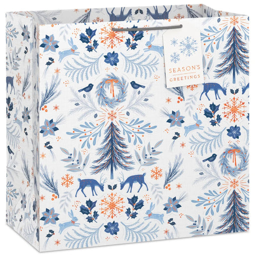 15-inch extra-deep white Christmas gift bag featuring a classic winter toile design and gift tag.
