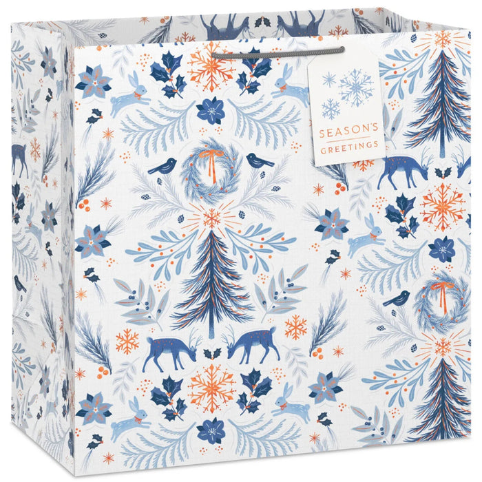 15-inch extra-deep white Christmas gift bag featuring a classic winter toile design and gift tag.