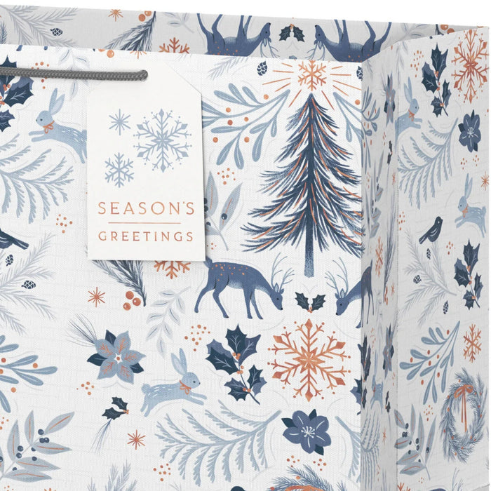 15-inch extra-deep white Christmas gift bag featuring a classic winter toile design and gift tag.