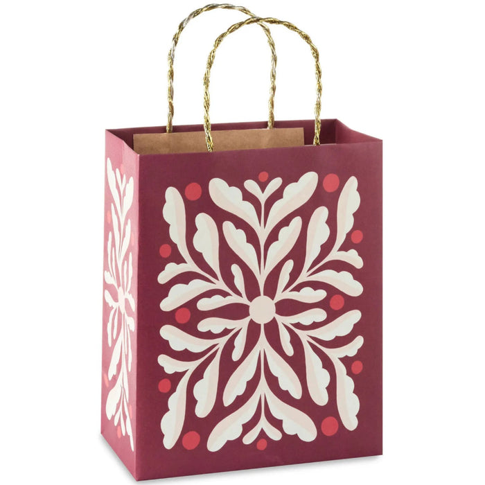 9.6-inch medium dark red Christmas gift bag featuring an abstract floral design.