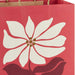 13-inch large red Christmas gift bag featuring a modern poinsettia design.