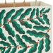 13-inch large Christmas gift bag featuring a modern holly design.