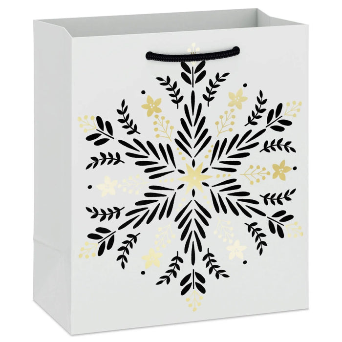 6.5-inch small Christmas gift bag featuring gold snowflakes on a black background.