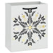 6.5-inch small Christmas gift bag featuring gold snowflakes on a black background.