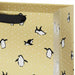 9.6-inch medium Christmas gift bag featuring penguins on a festive gold background.
