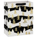 13-inch large Christmas gift bag featuring gold trees on a black and white background.