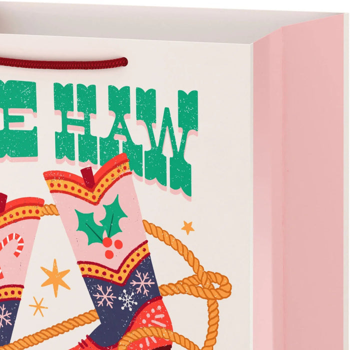 13-inch large Christmas gift bag featuring a festive “Yee Haw” Western boot design.