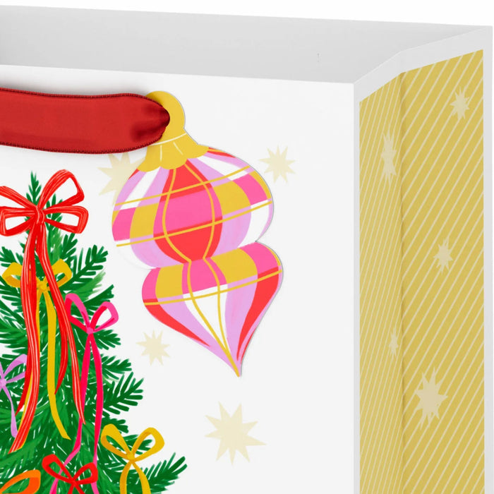 9.6-inch medium white Christmas gift bag featuring a pink and orange bow tree design with a gift tag.