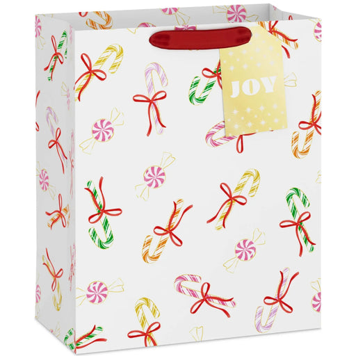 13-inch large white Christmas gift bag featuring colorful candy cane designs.
