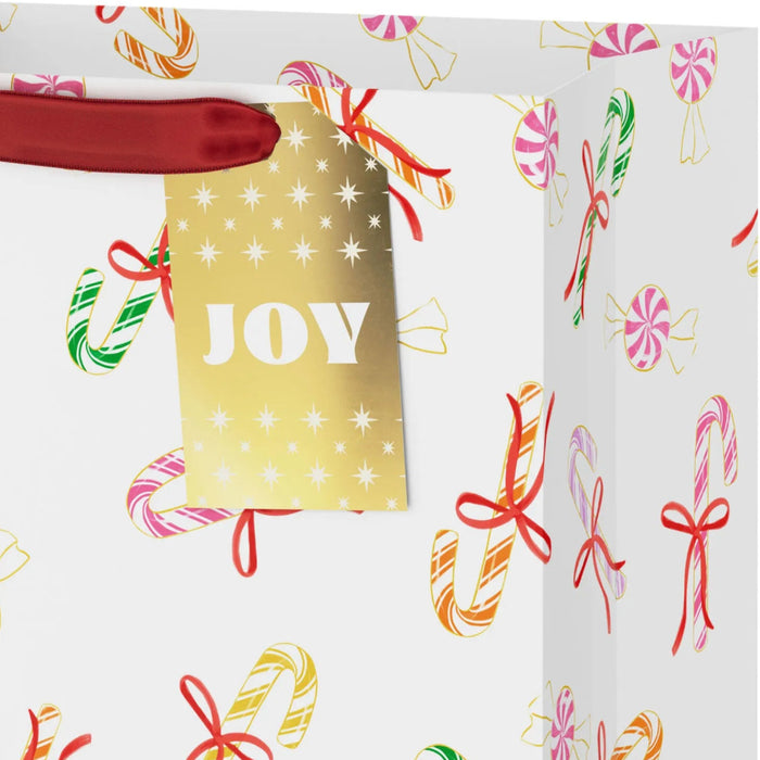 13-inch large white Christmas gift bag featuring colorful candy cane designs.