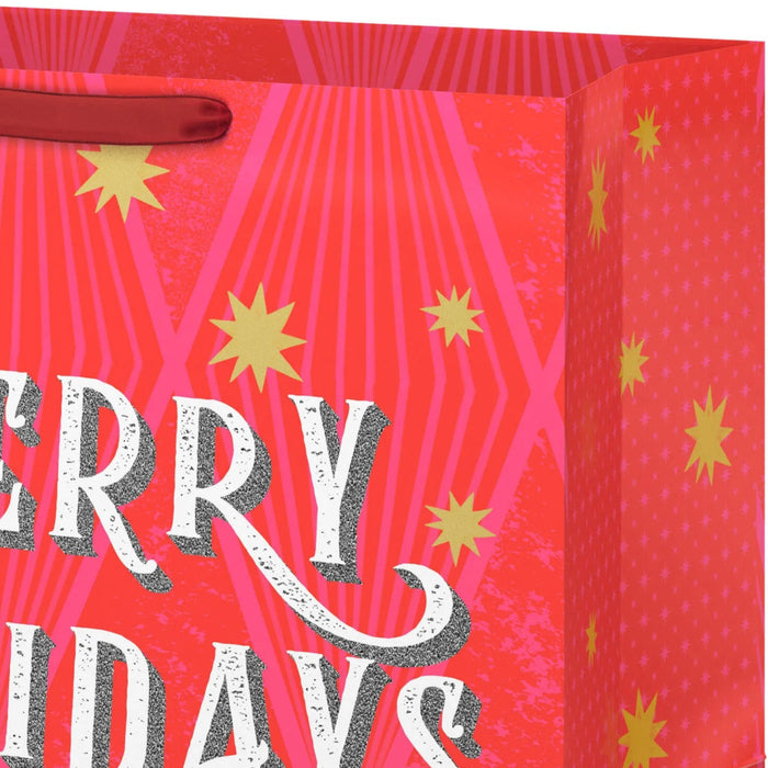 15-inch extra-deep Christmas gift bag featuring a glittery red and pink design.
