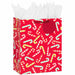 9.6-inch medium red Christmas gift bag featuring candy cane designs with tissue paper.