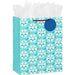 13-inch large blue Christmas gift bag featuring colorful rainbow snowflakes with tissue paper.