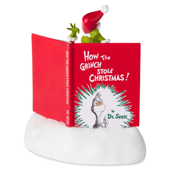 Dr. Seuss's How the Grinch Stole Christmas!™ Grinchy Trick 7.5-inch storybook figurine with sound for festive holiday décor.