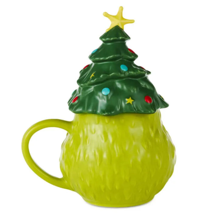 18 oz. Dr. Seuss Grinch sculpted mug featuring the Grinch with a Christmas tree
