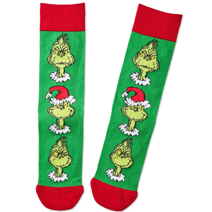 Dr. Seuss Grinch Smirks novelty crew socks featuring a playful smirking Grinch Christmas design