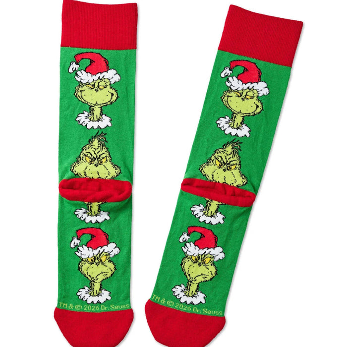 Dr. Seuss Grinch Smirks novelty crew socks featuring a playful smirking Grinch Christmas design