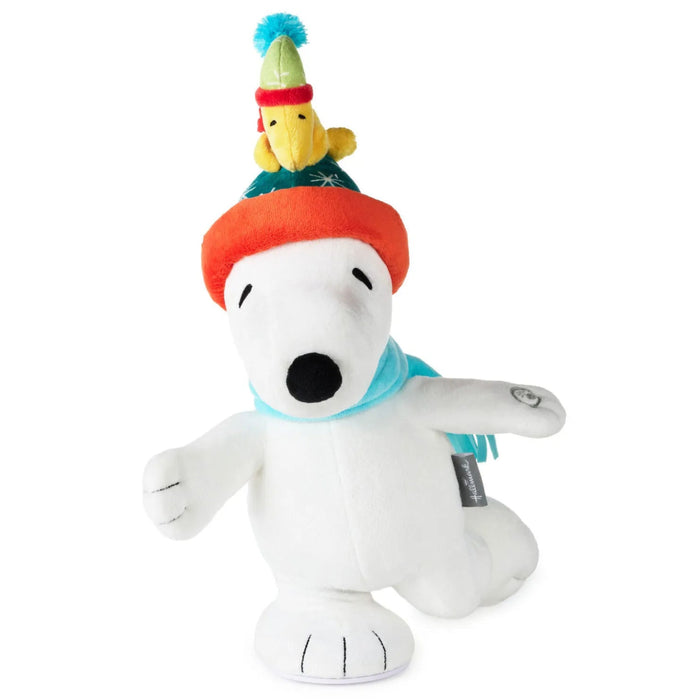 Peanuts Snoopy 12-inch ice skating plush with sound and motion for festive winter décor
