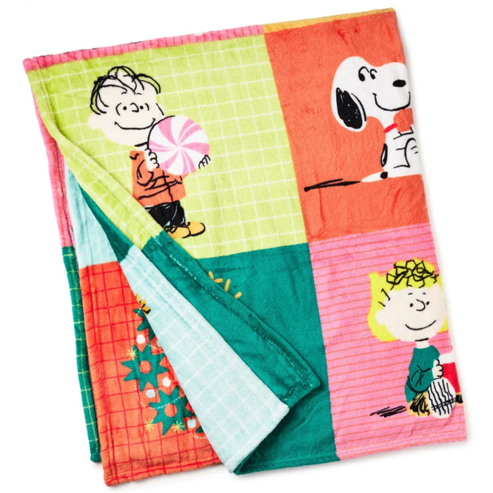 Peanuts Holiday Patchwork Throw Blanket measuring 50 x 60 inches with festive Christmas design