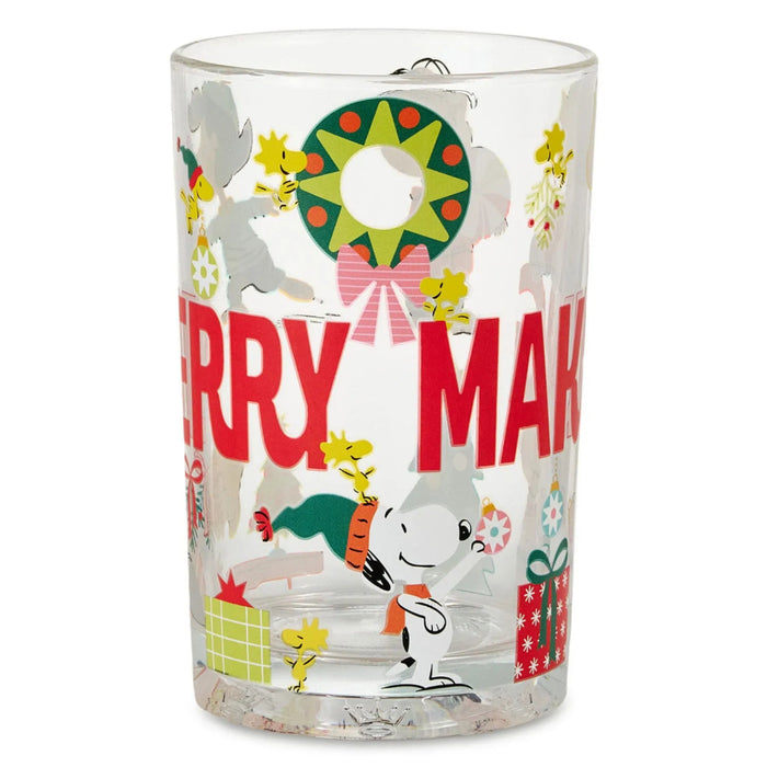 13.5 oz. Peanuts® Merry Making collectible drinking glass with a festive Christmas character design.