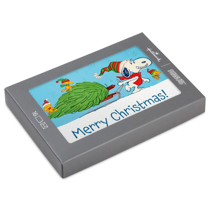 Hallmark Peanuts Snoopy Hauling the Tree boxed Christmas cards, pack of 16, featuring Snoopy and a festive Christmas tree.