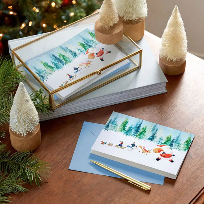 Hallmark Snowy Santa Claus Parade boxed Christmas cards featuring Santa Claus in a festive snowy winter scene, pack of 16