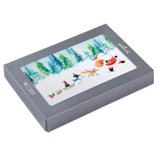 Hallmark Snowy Santa Claus Parade boxed Christmas cards featuring Santa Claus in a festive snowy winter scene, pack of 16
