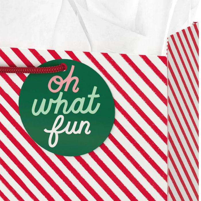 13-inch large red and white diagonal striped Christmas gift bag with tissue paper
