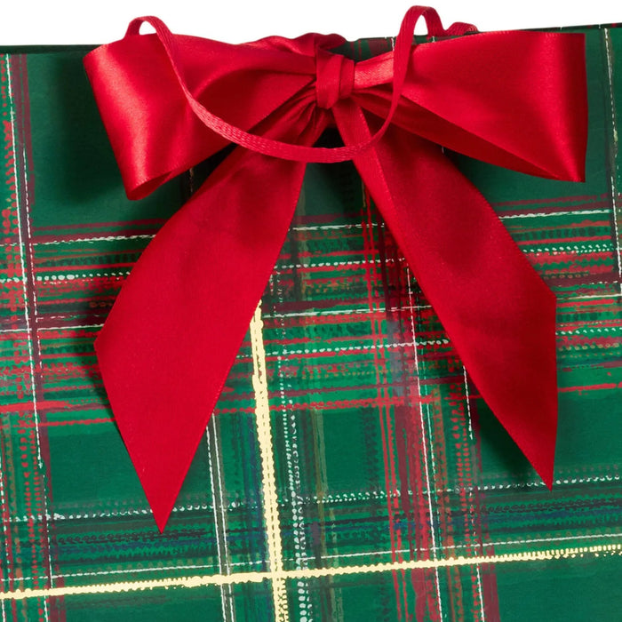 15-inch extra-deep green plaid Christmas gift bag with a decorative red bow
