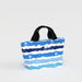 A blue and white striped tote bag with sturdy handles, suitable for shopping or casual outings.