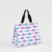 A tote bag featuring a white background with a blue fish pattern throughout its surface.