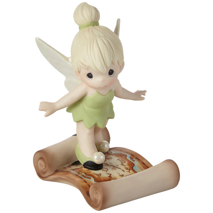 This pixie dressed as Tinker Bell surely leads the way to adventure.