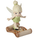 This pixie dressed as Tinker Bell surely leads the way to adventure.