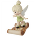 This pixie dressed as Tinker Bell surely leads the way to adventure.