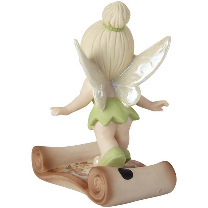 This pixie dressed as Tinker Bell surely leads the way to adventure.