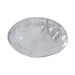 A silver plated oval tray displaying a starfish and a shell, elegantly arranged for decorative purposes.