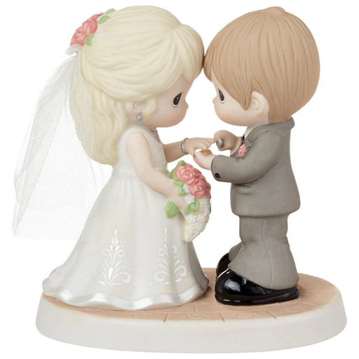Romantic wedding figurine featuring a beautifully detailed bride and groom.