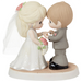 Romantic wedding figurine featuring a beautifully detailed bride and groom.