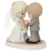 Romantic wedding figurine featuring a beautifully detailed bride and groom.