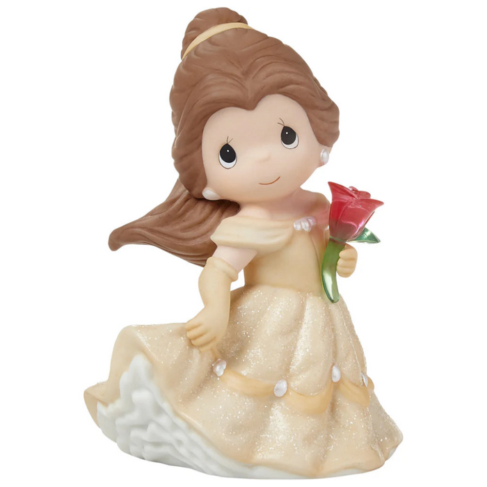 Beautiful buttery yellow gown with holding the enchanted rose.