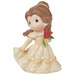 Beautiful buttery yellow gown with holding the enchanted rose.
