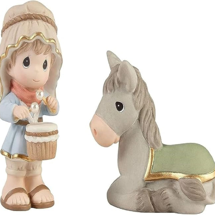 Little Drummer Boy and donkey bisque porcelain figurines displayed together as a Christmas collectible set with hand-painted details for holiday decorating.