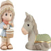 Little Drummer Boy and donkey bisque porcelain figurines displayed together as a Christmas collectible set with hand-painted details for holiday decorating.